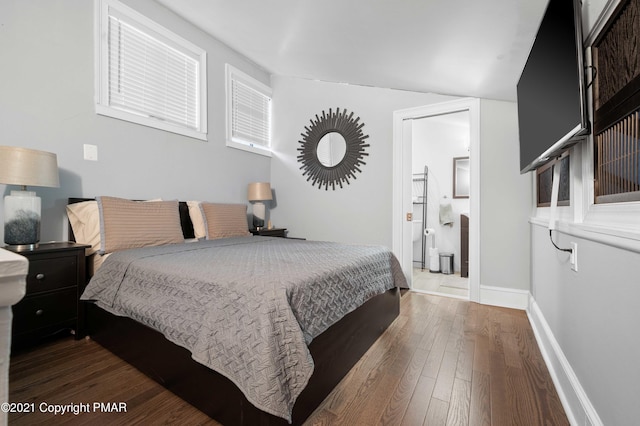 11 Middle Village Way, Tannersville, PA 18372 - bedroom with lofted ceiling, baseboards, and hardwood / wood-style floors