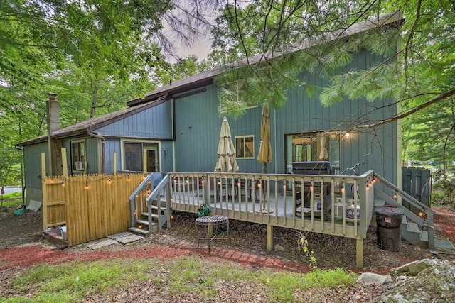 348 Fernwood Dr, East Stroudsburg, PA 18301 - back of house featuring a wooden deck and a chimney