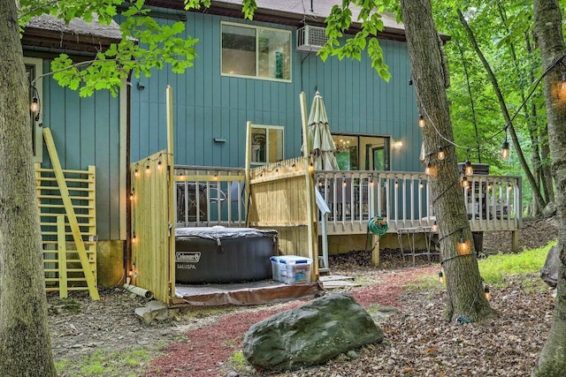 348 Fernwood Dr, East Stroudsburg, PA 18301 - back of house featuring a hot tub and a wooden deck