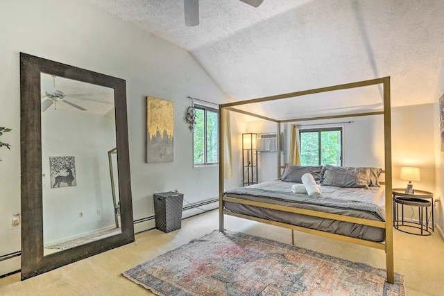 348 Fernwood Dr, East Stroudsburg, PA 18301 - carpeted bedroom featuring baseboard heating, lofted ceiling, a textured ceiling, a ceiling fan, and a wall unit AC