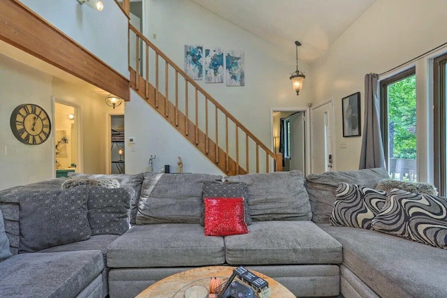 348 Fernwood Dr, East Stroudsburg, PA 18301 - living area featuring high vaulted ceiling and stairway
