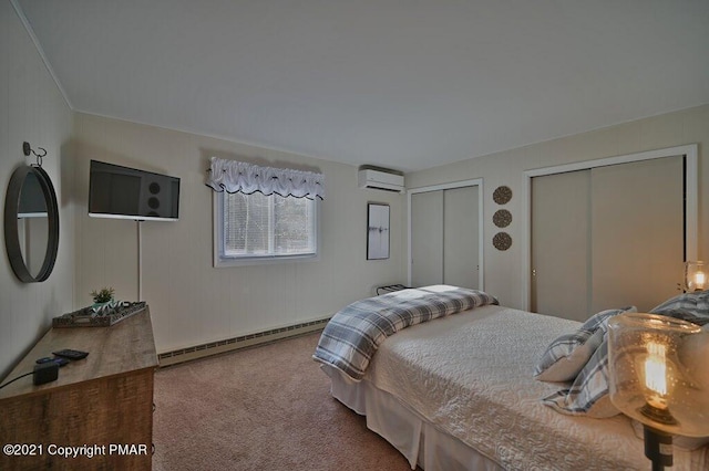 36 Maplewood Rd, Lake Harmony, PA 18624 - bedroom with a baseboard radiator, a wall unit AC, multiple closets, and carpet flooring