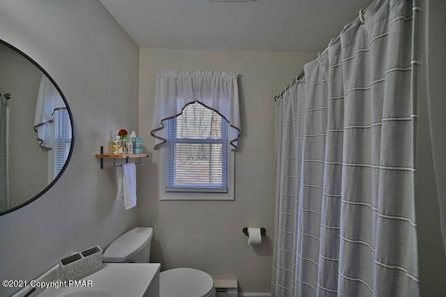 36 Maplewood Rd, Lake Harmony, PA 18624 - bathroom featuring toilet, vanity, baseboards, and a shower with curtain