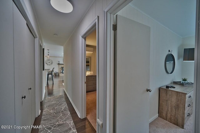 36 Maplewood Rd, Lake Harmony, PA 18624 - corridor with dark wood finished floors, crown molding, and baseboards