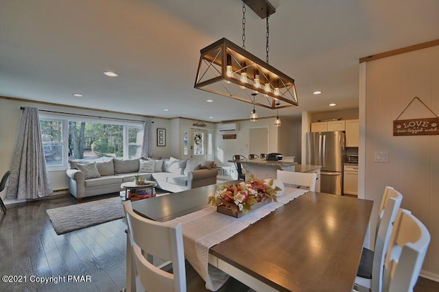 36 Maplewood Rd, Lake Harmony, PA 18624 - dining area featuring a wall unit AC, dark wood-type flooring, and recessed lighting