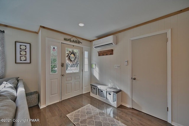 36 Maplewood Rd, Lake Harmony, PA 18624 - foyer entrance featuring a wall mounted AC, crown molding, dark wood-style flooring, and baseboards