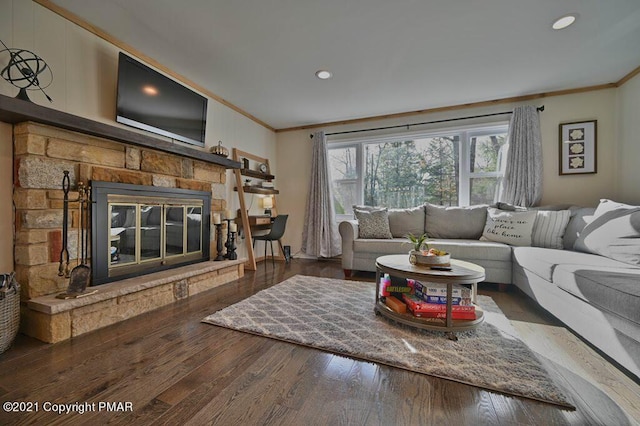 36 Maplewood Rd, Lake Harmony, PA 18624 - living room with crown molding, wood finished floors, recessed lighting, and a stone fireplace