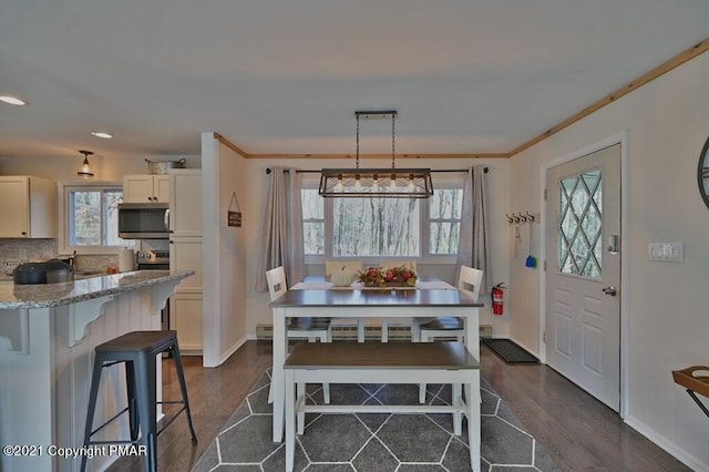 36 Maplewood Rd, Lake Harmony, PA 18624 - dining room with dark wood-style flooring, baseboards, a baseboard radiator, and recessed lighting