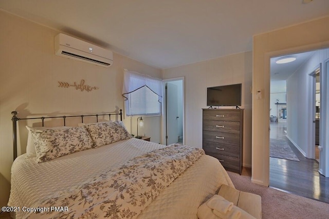 36 Maplewood Rd, Lake Harmony, PA 18624 - bedroom with an AC wall unit, carpet flooring, and multiple windows