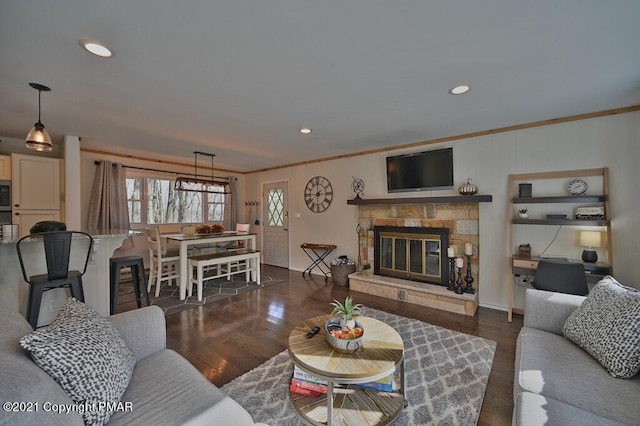 36 Maplewood Rd, Lake Harmony, PA 18624 - living room with crown molding, dark wood-style floors, recessed lighting, and a fireplace
