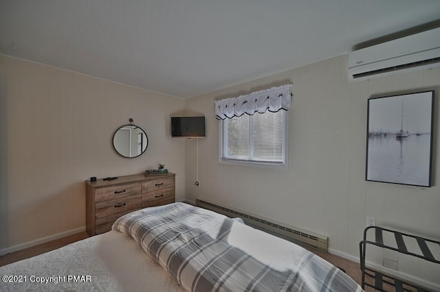 36 Maplewood Rd, Lake Harmony, PA 18624 - carpeted bedroom featuring a baseboard radiator, a wall unit AC, and baseboards