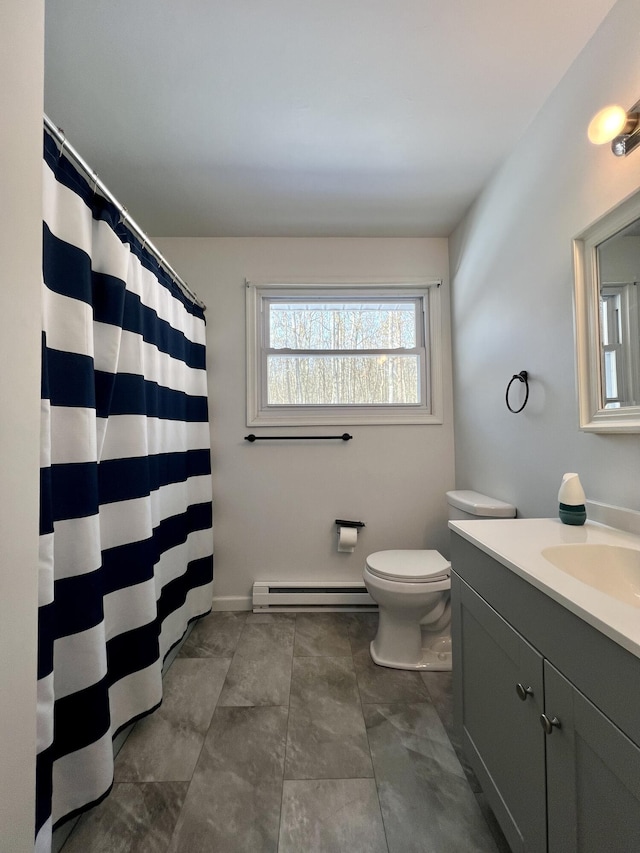 full bathroom featuring a baseboard heating unit, toilet, vanity, baseboards, and a shower with shower curtain