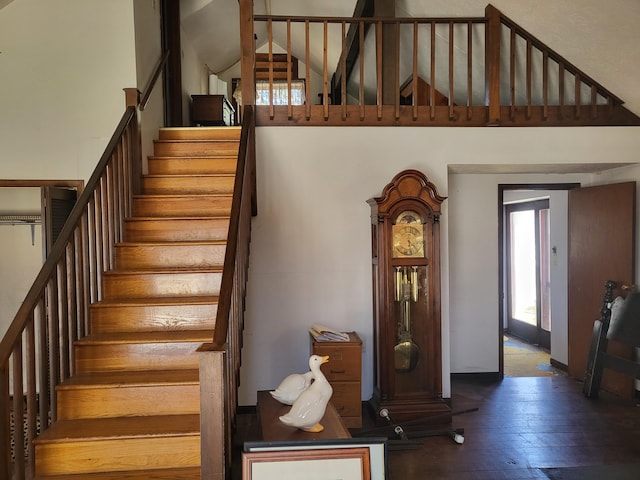 216 Buckhorn Ln, Cresco, PA 18326 - staircase featuring high vaulted ceiling, hardwood / wood-style flooring, and baseboards
