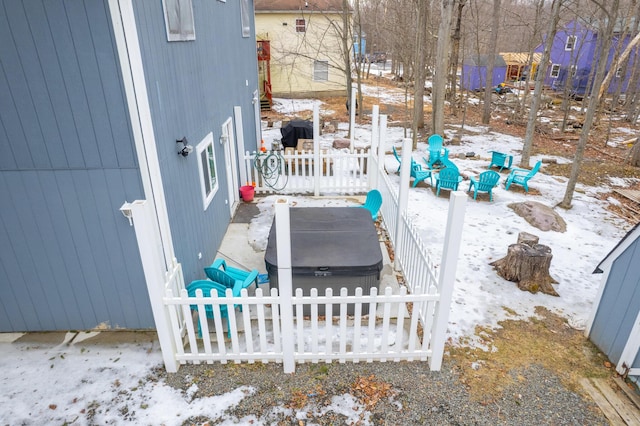 view of yard layered in snow