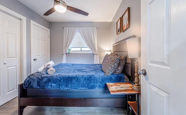 bedroom featuring ceiling fan and wood finished floors