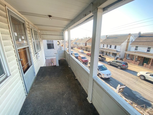 balcony featuring a residential view