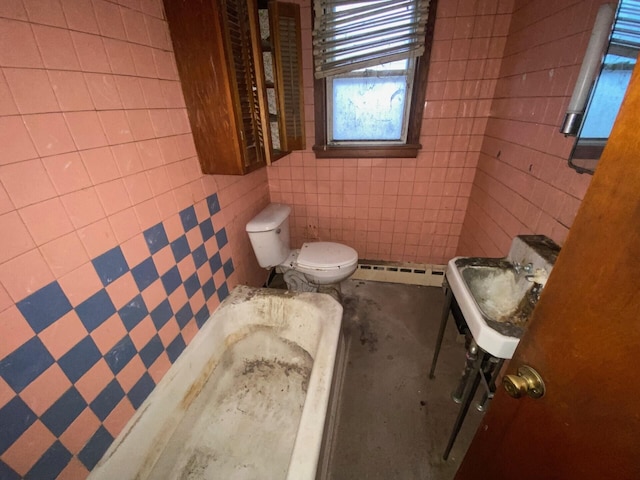 bathroom featuring a baseboard heating unit, tile walls, and toilet