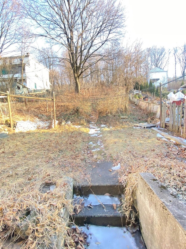 view of yard with fence