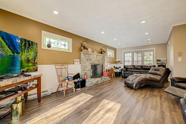 154 Elgin Way, Bushkill, PA 18324 - living room featuring a fireplace, a wainscoted wall, recessed lighting, wood finished floors, and ornamental molding