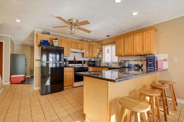 154 Elgin Way, Bushkill, PA 18324 - kitchen with crown molding, black appliances, a peninsula, under cabinet range hood, and light tile patterned flooring