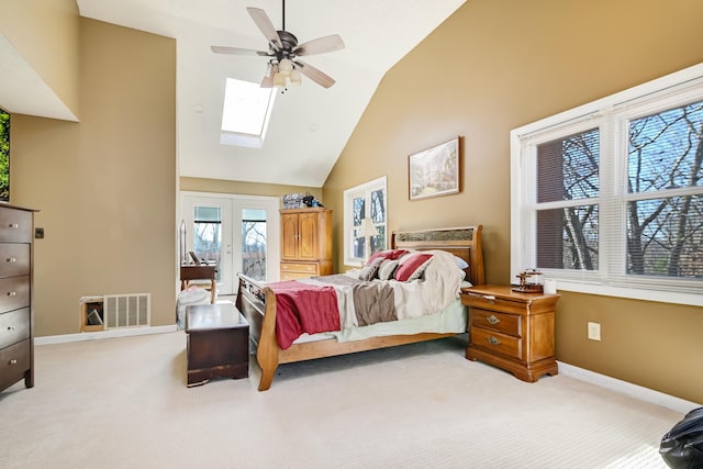 154 Elgin Way, Bushkill, PA 18324 - carpeted bedroom featuring visible vents, baseboards, high vaulted ceiling, and a skylight