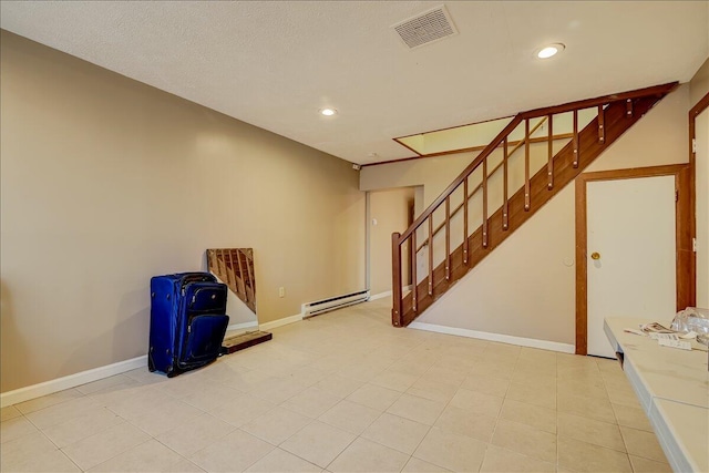 154 Elgin Way, Bushkill, PA 18324 - basement with visible vents, stairway, baseboards, a baseboard heating unit, and recessed lighting