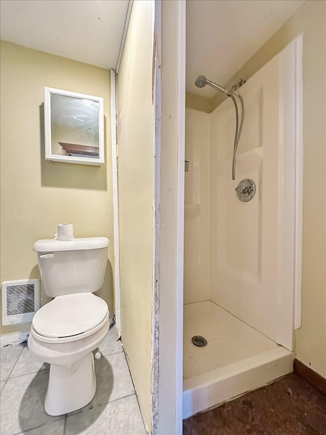 154 Elgin Way, Bushkill, PA 18324 - bathroom featuring baseboards, a stall shower, toilet, and visible vents