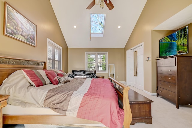 154 Elgin Way, Bushkill, PA 18324 - bedroom with ceiling fan, light colored carpet, vaulted ceiling with skylight, recessed lighting, and baseboards