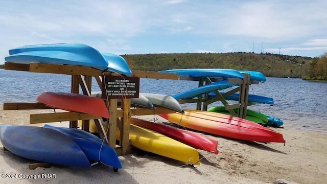 community play area featuring a water view