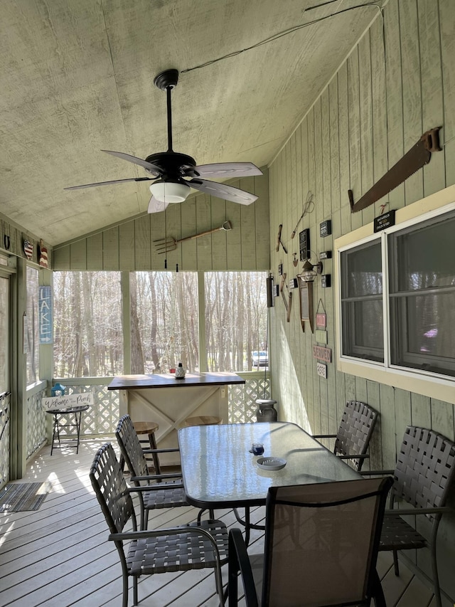 deck with ceiling fan and outdoor dining area