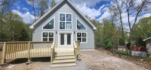 251 Bellingham Dr, Bushkill, PA 18324 - view of front facade featuring a wooden deck and french doors