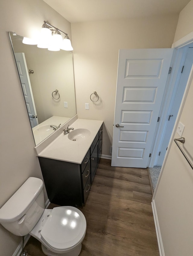 251 Bellingham Dr, Bushkill, PA 18324 - bathroom with wood finished floors and vanity
