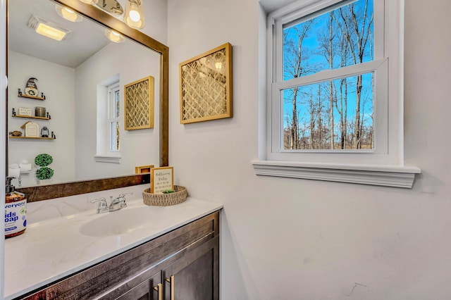 bathroom with visible vents and vanity