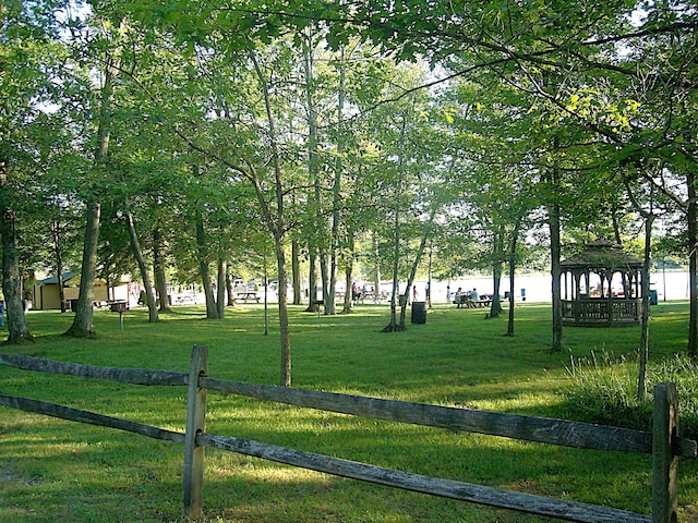 surrounding community featuring a gazebo and a yard