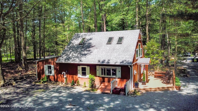 view of front of home with a wooden deck