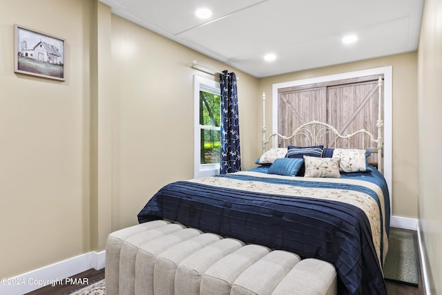 bedroom featuring hardwood / wood-style flooring