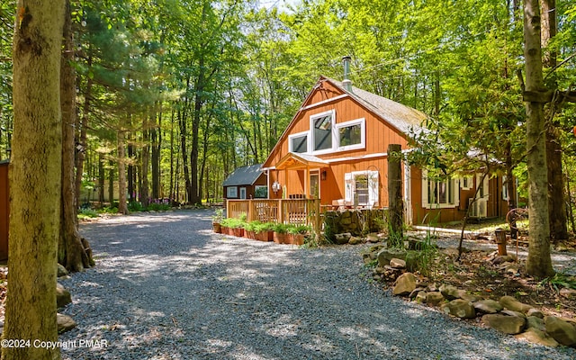 view of front of house featuring a wooden deck