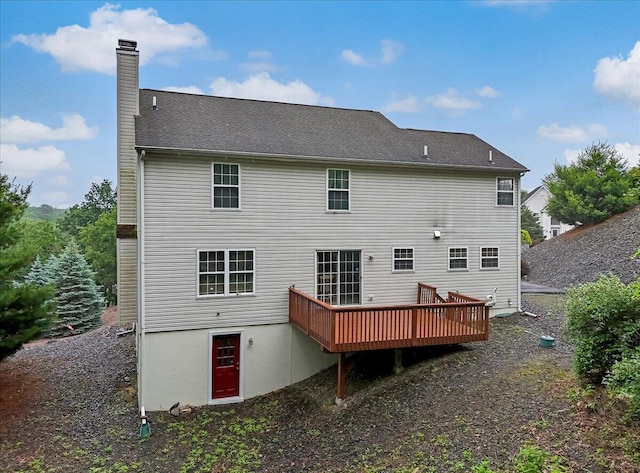 706 Franklin Ct, East Stroudsburg, PA 18302 - rear view of property with a chimney and a deck