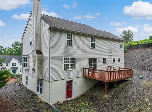 706 Franklin Ct, East Stroudsburg, PA 18302 - back of house with a wooden deck and a chimney