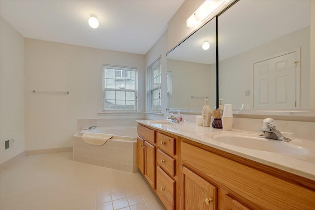 706 Franklin Ct, East Stroudsburg, PA 18302 - bathroom with double vanity, a bath, and tile patterned flooring