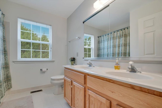 706 Franklin Ct, East Stroudsburg, PA 18302 - full bath with plenty of natural light, double vanity, tile patterned floors, and a shower with curtain