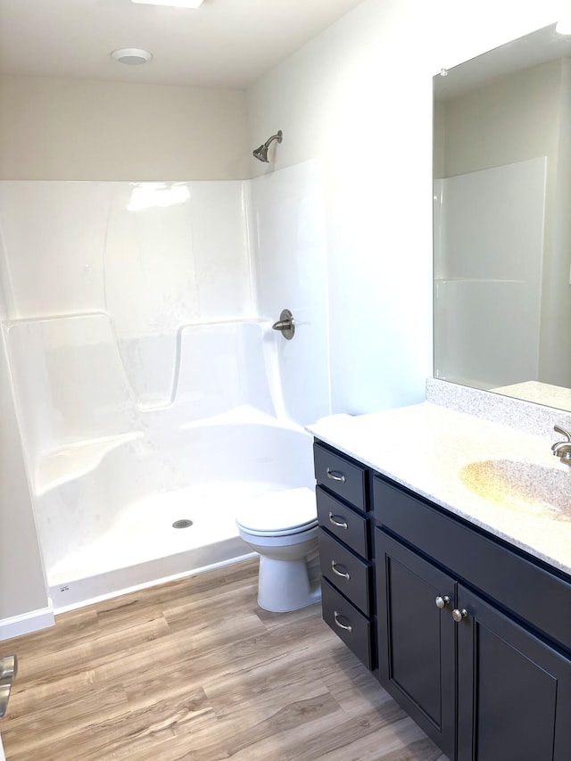 20 Leaf Ct, East Stroudsburg, PA 18302 - full bath with a shower, toilet, vanity, and wood finished floors