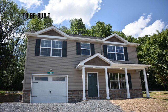20 Leaf Ct, East Stroudsburg, PA 18302 - craftsman house with stone siding, an attached garage, and a porch
