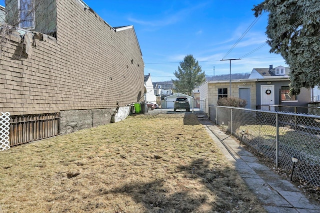 view of yard featuring fence