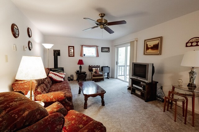 20 Horseshoe Dr, White Haven, PA 18661 - carpeted living area featuring a ceiling fan and a wood stove