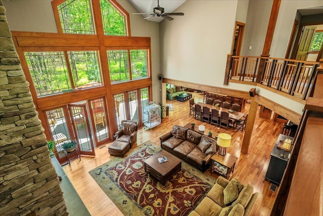 44 Watawga Way W, Gouldsboro, PA 18424 - living area featuring high vaulted ceiling, ceiling fan, and wood finished floors