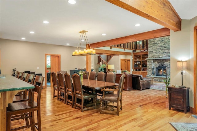 44 Watawga Way W, Gouldsboro, PA 18424 - dining space with light wood-style flooring, recessed lighting, beamed ceiling, and a fireplace