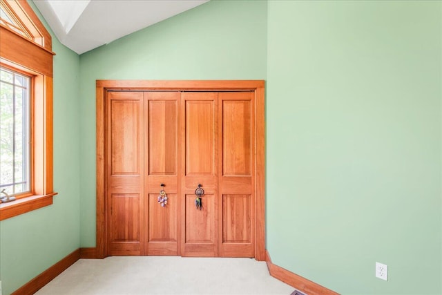 44 Watawga Way W, Gouldsboro, PA 18424 - unfurnished bedroom featuring light colored carpet, lofted ceiling, and baseboards