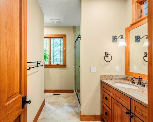 44 Watawga Way W, Gouldsboro, PA 18424 - bathroom with a stall shower, baseboards, vanity, and tile patterned floors