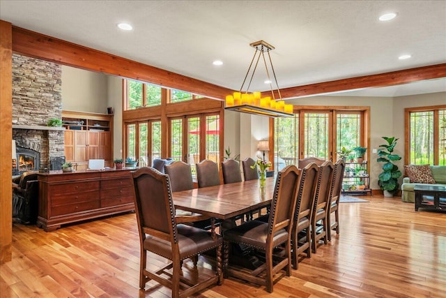 44 Watawga Way W, Gouldsboro, PA 18424 - dining space with beam ceiling, recessed lighting, a stone fireplace, and light wood-style floors